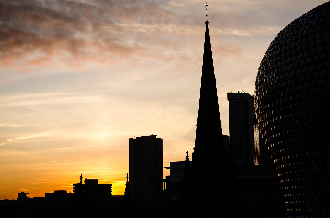 Birmingham skyline at sunset, showcasing the city as a destination for corporate events and conference venues.